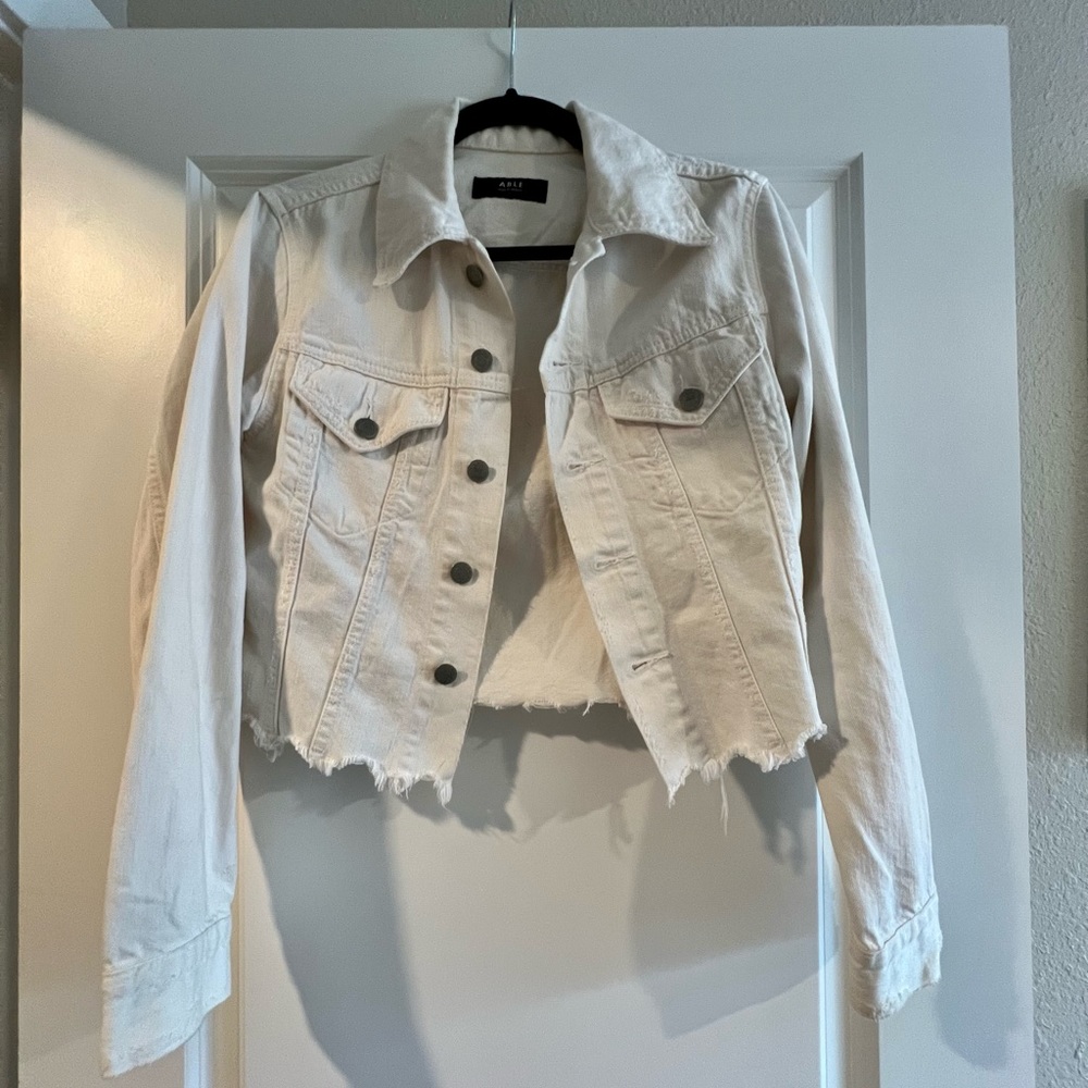 Able crop white denim jacket. Raw hem